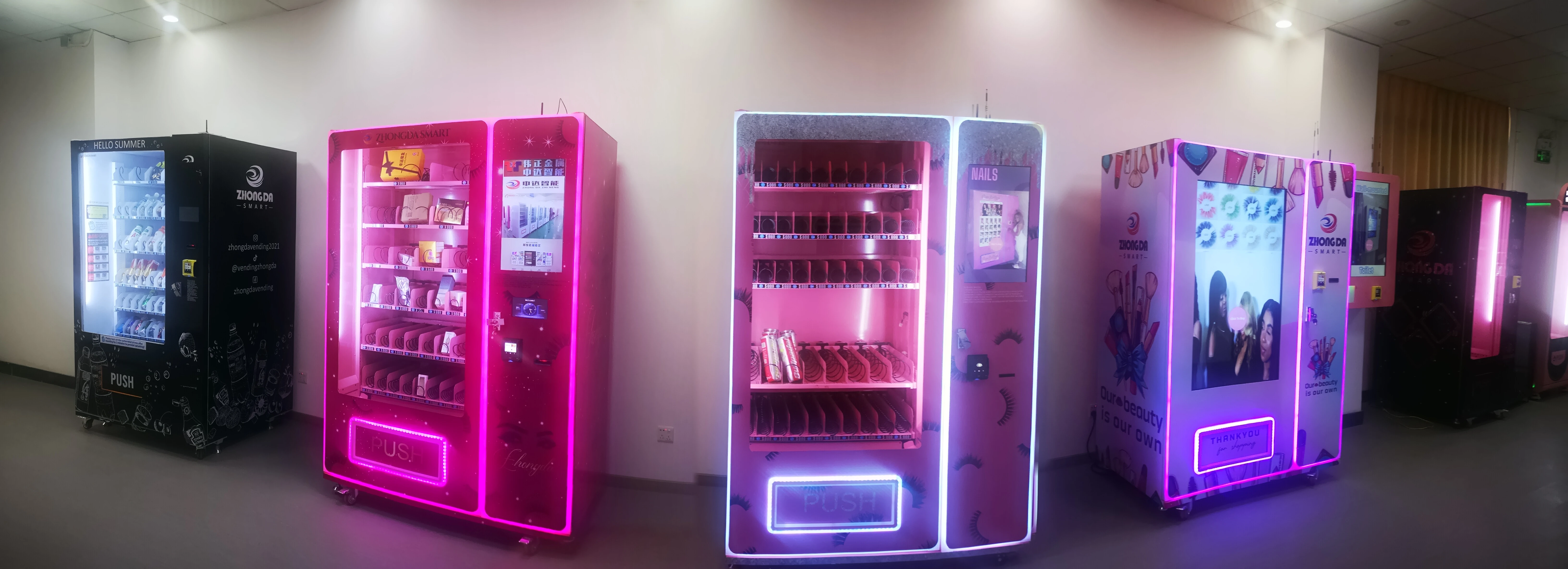 Rows of completed vending machines used for configuration review before shipment